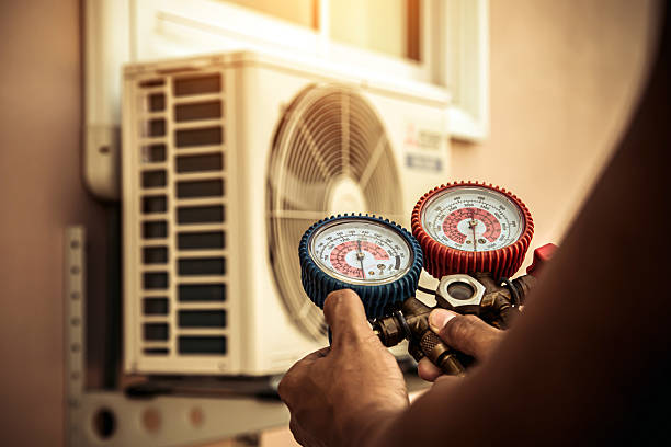 Professional Air Conditioning Service technician working in Fairfield, NJ